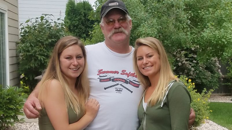 Grease Monkey franchisees Sara and Miranda White with their dad.